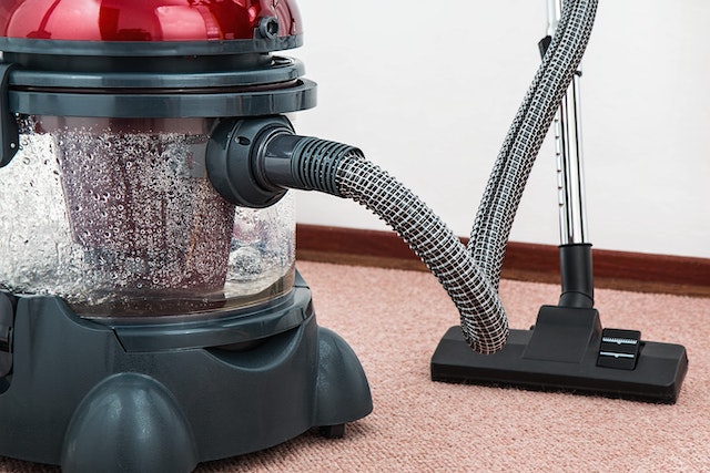 vacuum on top of a carpet